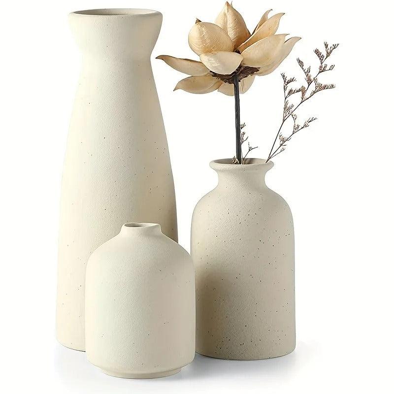 Elara Haus Speckled Ceramic Vase Set Trio, featuring a mix of flowers in the 3 ceramic vases