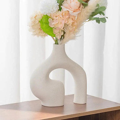Abstract double ceramic vase on a shelf, home decor inspiration
