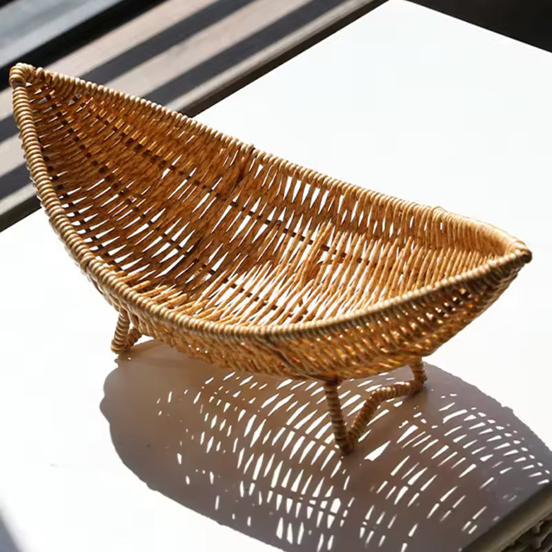 Woven willow storage basket with natural wooden handle and organizer functionality