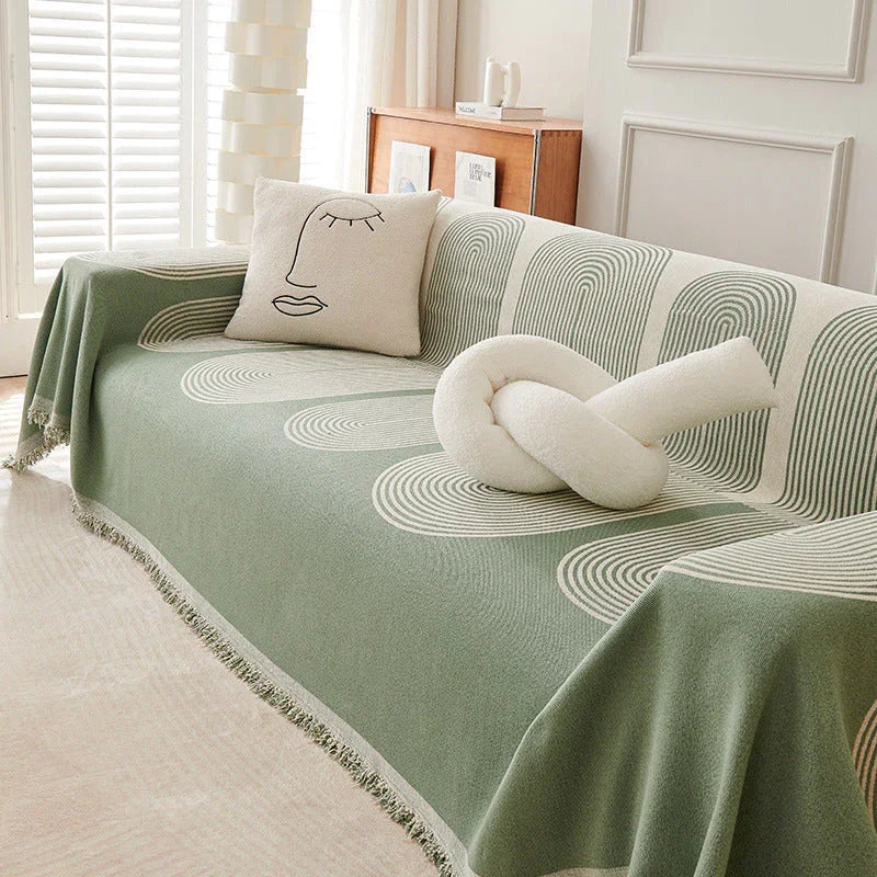 Soft pistachio green chenille throw blanket by Elara Haus, adds warmth to any room