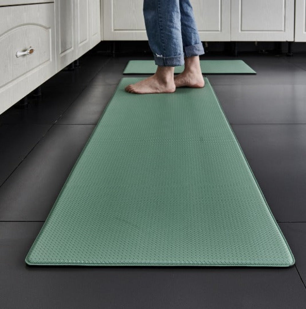Kitchen floor rug with ergonomic design and non-slip base for stability