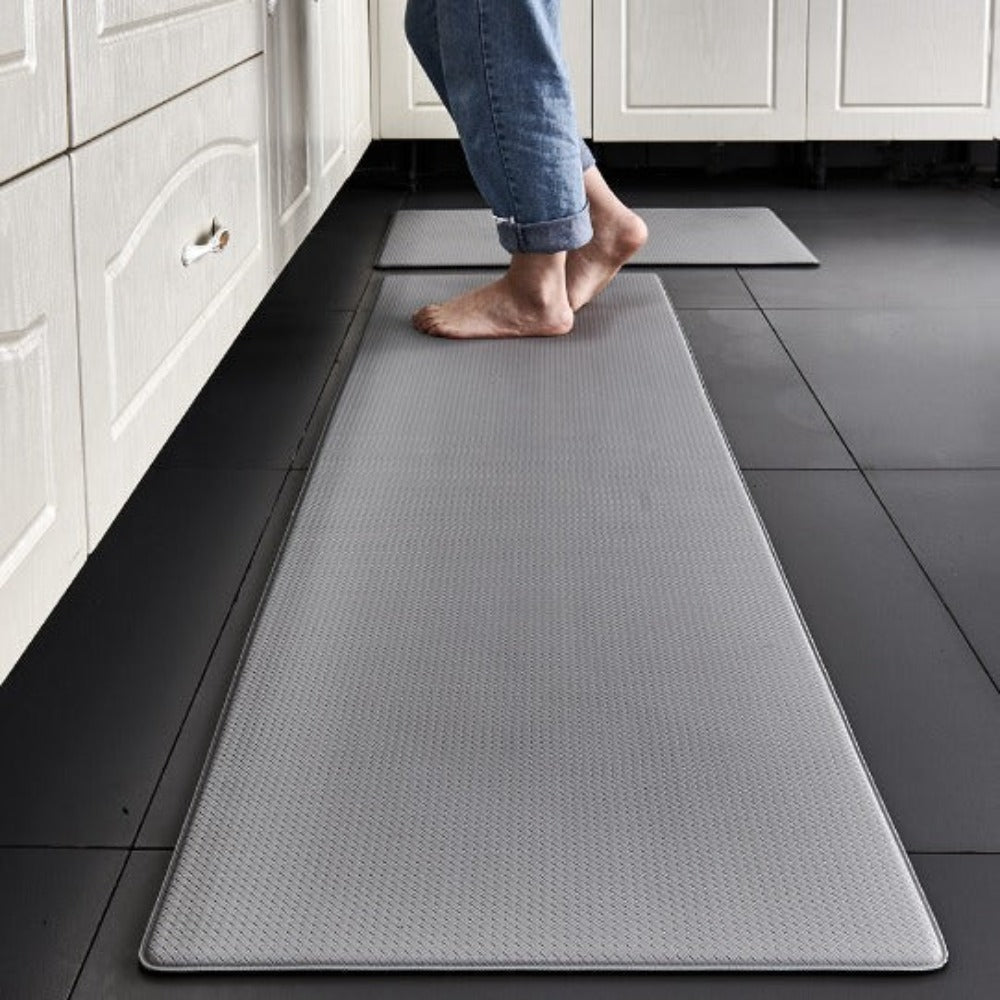 Kitchen floor mat with ergonomic design and non-slip surface for comfort