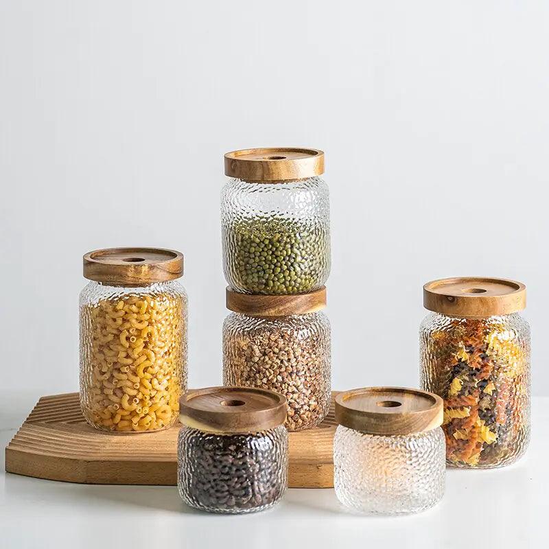 Dark timber and glass storage jar for kitchen and pantry use