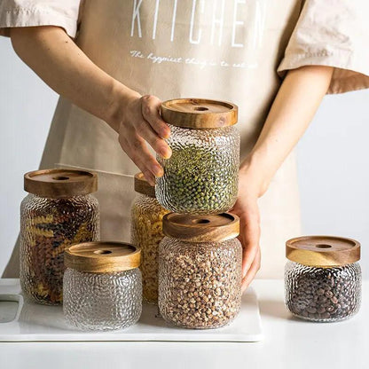 Airtight glass storage jar with dark timber wood and glass design