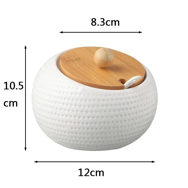 Close-up of ceramic and bamboo sugar container with modern relief design