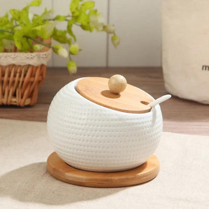 Ceramic sugar container with bamboo lid and relief pattern