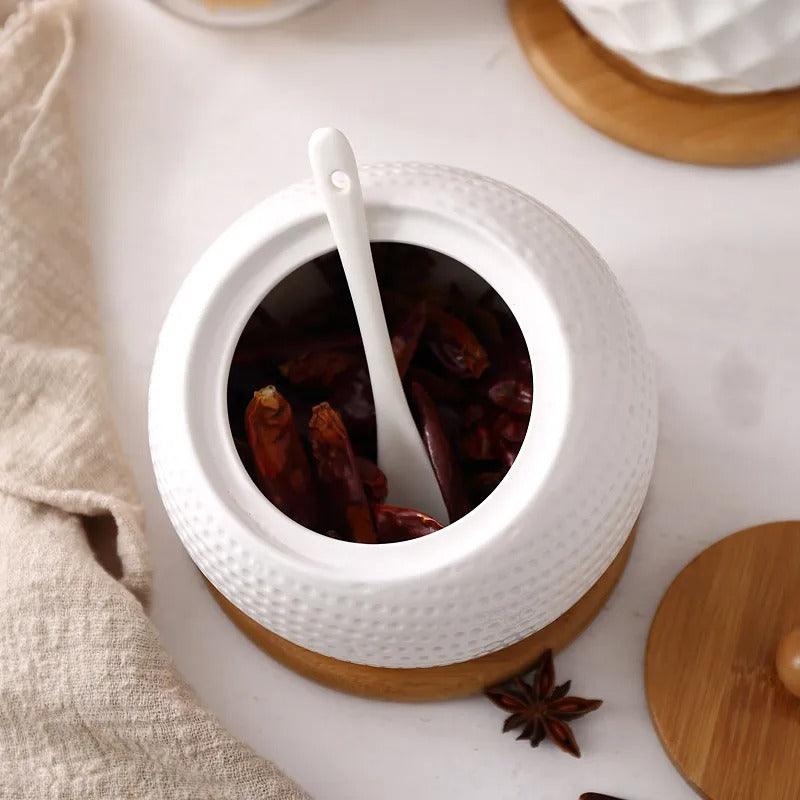 Ceramic sugar container with natural bamboo lid and dimpled pattern