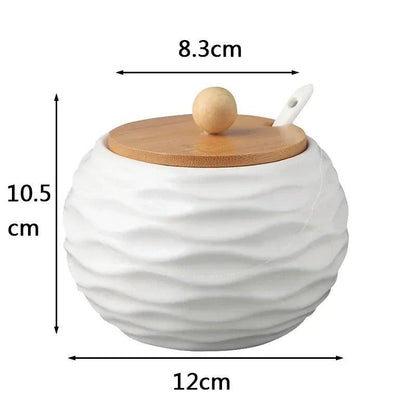 Close-up of ceramic sugar bowl with bamboo lid and relief pattern
