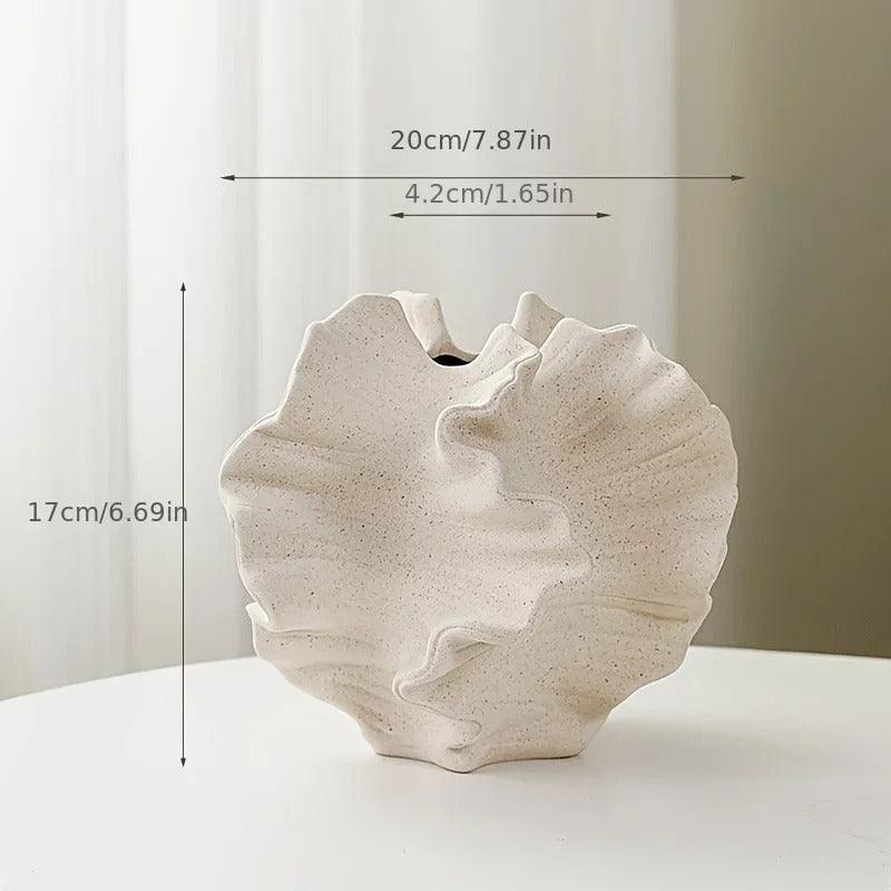 Alternative view of a minimalist coral vase made from ceramic, showcasing a cream matte finish.