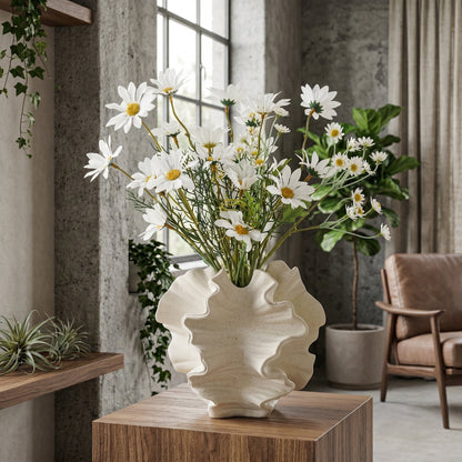 Modern sandstone bud vase trio with a cream matte finish, perfect for minimalist decor.