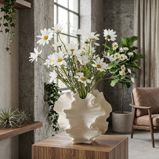 Modern sandstone bud vase trio with a cream matte finish, perfect for minimalist decor.