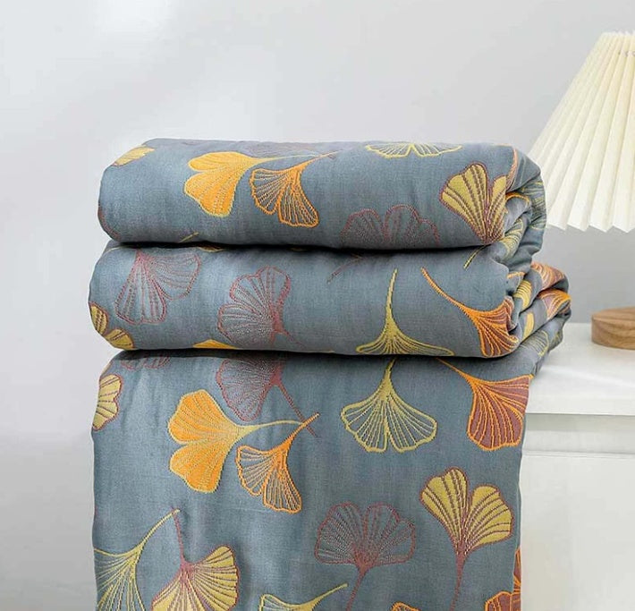Cozy Elara Haus reversible cotton throw with intricate ginkgo leaf pattern for interior design