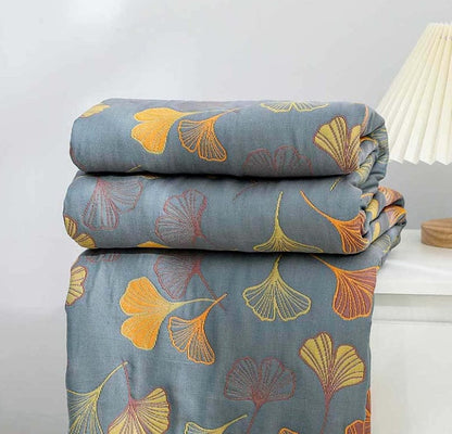 Cozy Elara Haus reversible cotton throw with intricate ginkgo leaf pattern for interior design