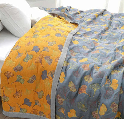 Luxury Elara Haus reversible cotton throw featuring beautiful ginkgo leaf design and high-quality materials