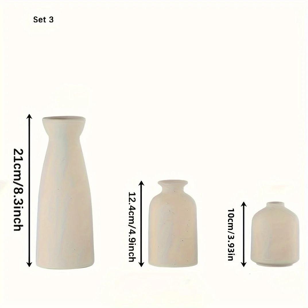 Elara Haus Speckled Ceramic Vase Set Trio, showcasing the 3-piece set in a decorative setting