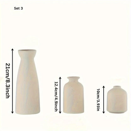 Elara Haus Speckled Ceramic Vase Set Trio, showcasing the 3-piece set in a decorative setting