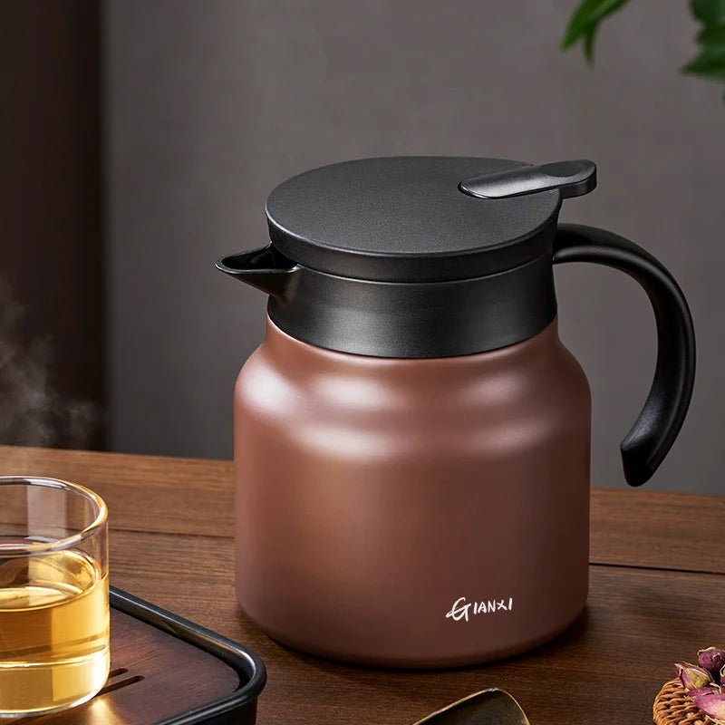Side view of Elara Haus 800ml Insulated Ceramic Teapot with infuser and handle