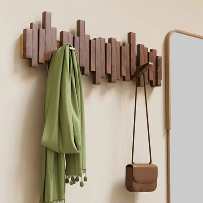 Close-up of premium wooden coat hooks on wall mount