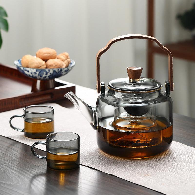 Grijzen Japandi glass teapot with infuser for loose tea