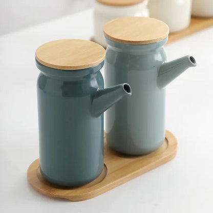 Close-up of Nordic ceramic seasoning bottle with wood grain and ceramic details.