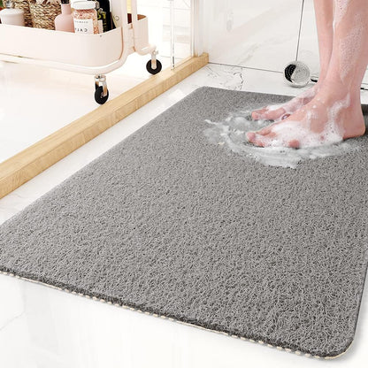 Loofah-style textured shower mat for slip resistance and comfort
